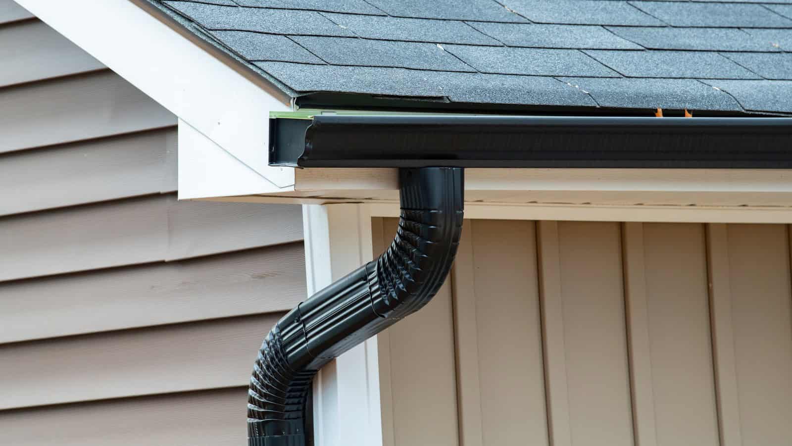 rain,gutter,of,roof,with,downpipe,new,metal,pipecorner